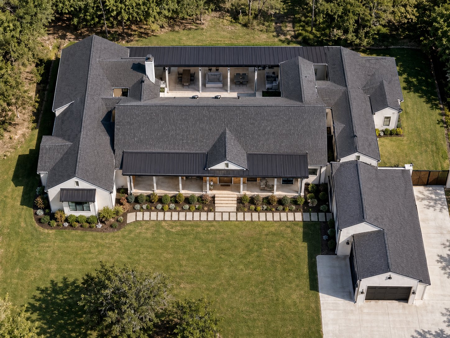 Aerial view of modern farmhouse custom home in Cypress TX