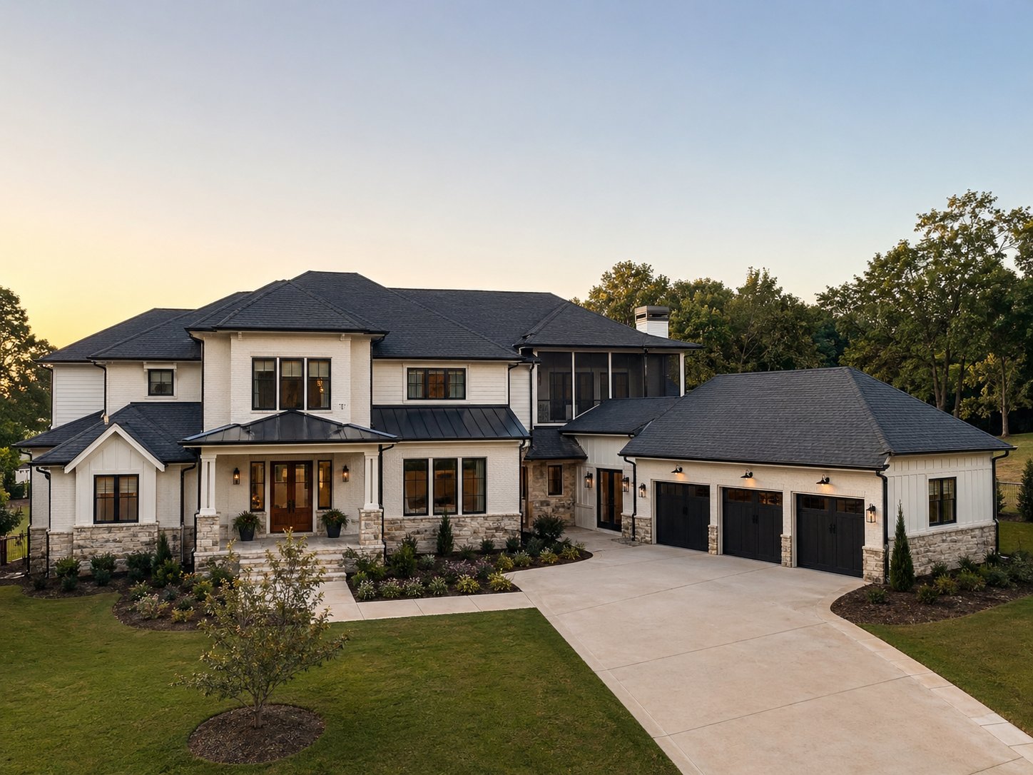 Transitional luxury custom home exterior with balanced stone detailing in Pearland TX
